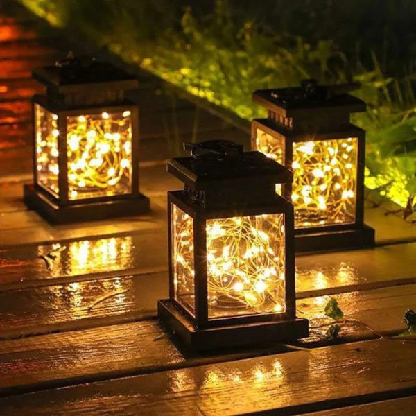 Солнечный подвесной фонарь UniSolar NF101 с тёплым LED-светом и влагозащитой для улицы