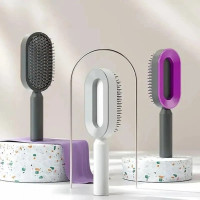 Щетка для волос 3D Central Hollow Cushion Comb массажная с кнопкой очистки